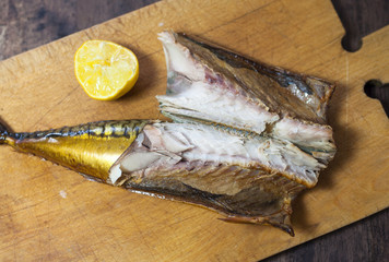 Smoked mackerel on kitchen background - studio shot