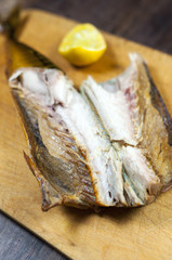 Smoked mackerel on kitchen background - studio shot