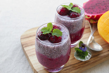 Chia seeds pudding with red dragon fruit and mango