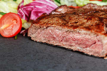 Roasted steak on slate plate