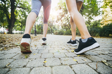 Closeup of female feet while jogging
