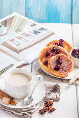 Cottage cheese pancakes with cherry sauce