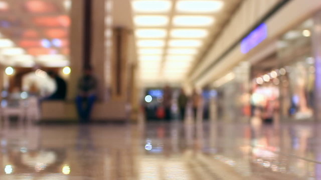 Timelapse people walking in the hypermarket to make a purchase,alienated,out of focus