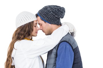 Happy couple embracing head to head