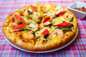 Homemade pizza ready to eat.