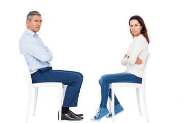 Obraz premium Couple arguing while sitting