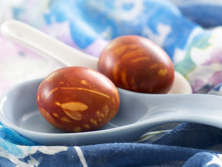 Easter eggs in blue Japanese soup spoon