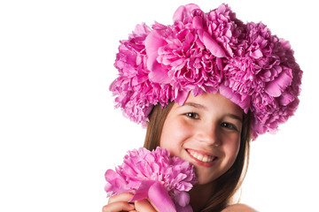 Girl with wreath of pink flowers on isolated white background