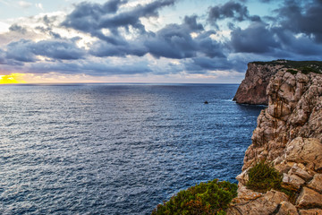 cloudy sky over Capo Caccia coastline