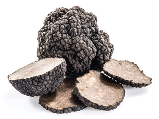 Black truffles isolated on a white background.