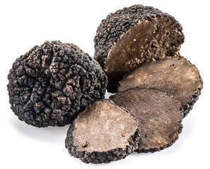 Black truffles isolated on a white background.