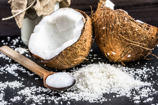 Fresh coconut and coconut oil for massage or cooking