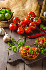 Italian bruschetta with roasted tomatoes and garlic