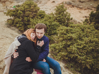 Naklejka na ściany i meble couple in love relaxing, mountain Coast Crimea, Ukraine