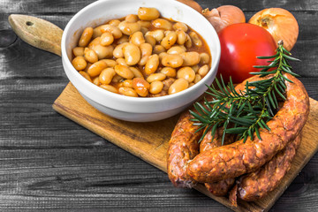 Baked beans with sausage in tomato sauce
