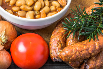 Baked beans with sausage in tomato sauce