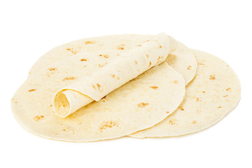 Round wheat tortillas close-up isolated on white background. Lavash.