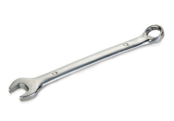 Combination wrench close-up isolated on a white background.