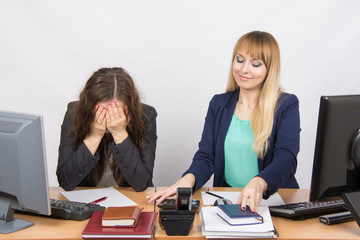 The situation in the office - one girl is very upset, others are pretty straightens things on your...