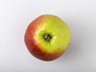 green and red ripe apple top