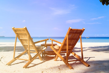 chairs of tropical sand beach