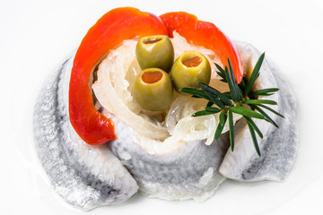 Marinated herrings isolated on white background
