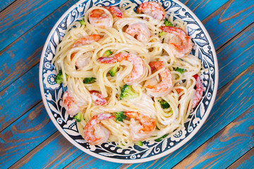 Creamy Shrimp and broccoli Spaghetti. View from above, top studio shot