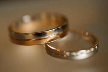 Closeup with wedding rings on isolated background