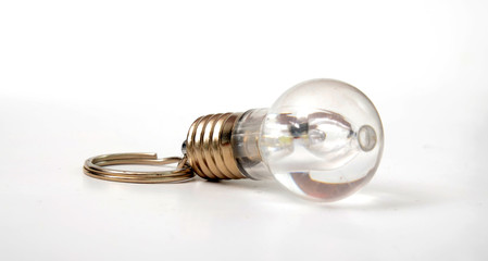 Light bulb key holder on white