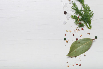 Herbs and spices on white wooden background. Space for text - 104923642