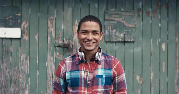 Slow Motion Portrait of mixed race man smiling