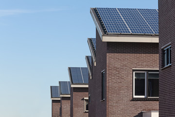 Family house with solar panels for alternative energy