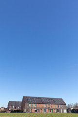 Family house with solar panels for alternative energy