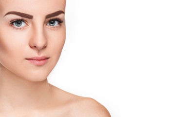 The beautiful face of young woman with cleanf fresh skin 