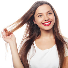 Portrait of happy smiling young beautiful woman