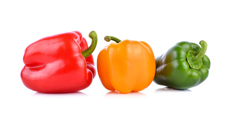 colored peppers on white background