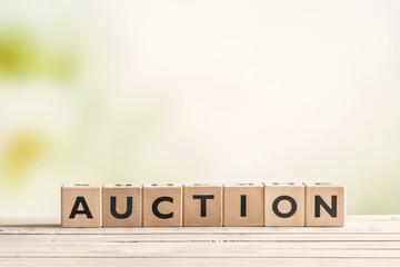 Auction sign on a vintage table
