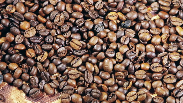 Roasted coffee beans. dolly shot