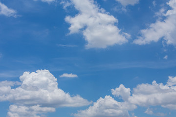 Naklejka na ściany i meble fluffy cloud on clear blue sky background