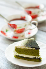 Japanese Matcha Green tea cake on white plate