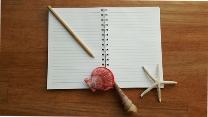 notebook paper with pensil