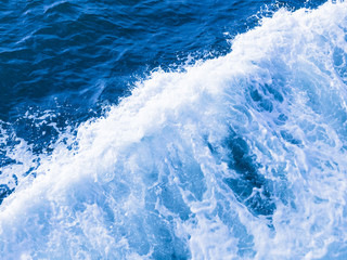 blue water and white foam boils