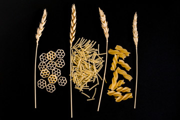 Wheat ears are surrounded by pasta