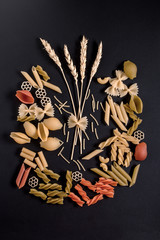 Wheat ears are surrounded by pasta