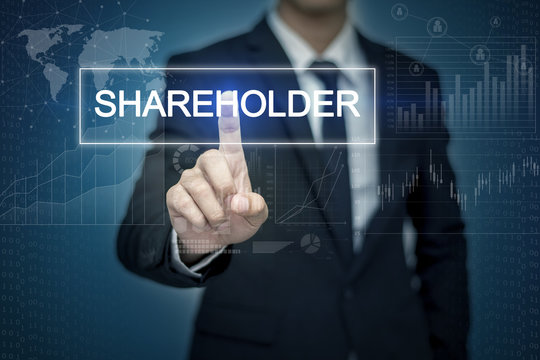 Businessman hand touching SHAREHOLDER  button on virtual screen