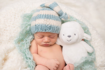 Newborn Baby Sleeping with Toy