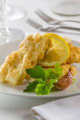 Battered hake served with 