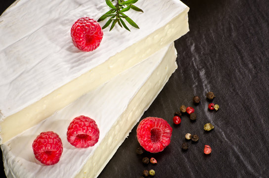 Camembert cheese with raspberry as a delicious dessert