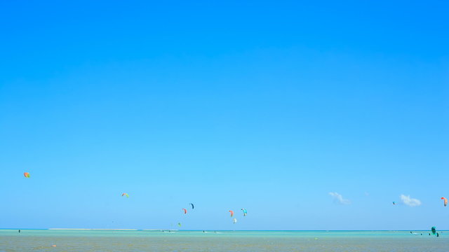 People engaged in kite surfing in the Kite Village at the Red Sea near Hamata Marine.