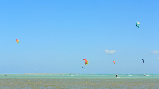 People engaged in kite surfing in the Kite Village at the Red Sea near Hamata Marine.